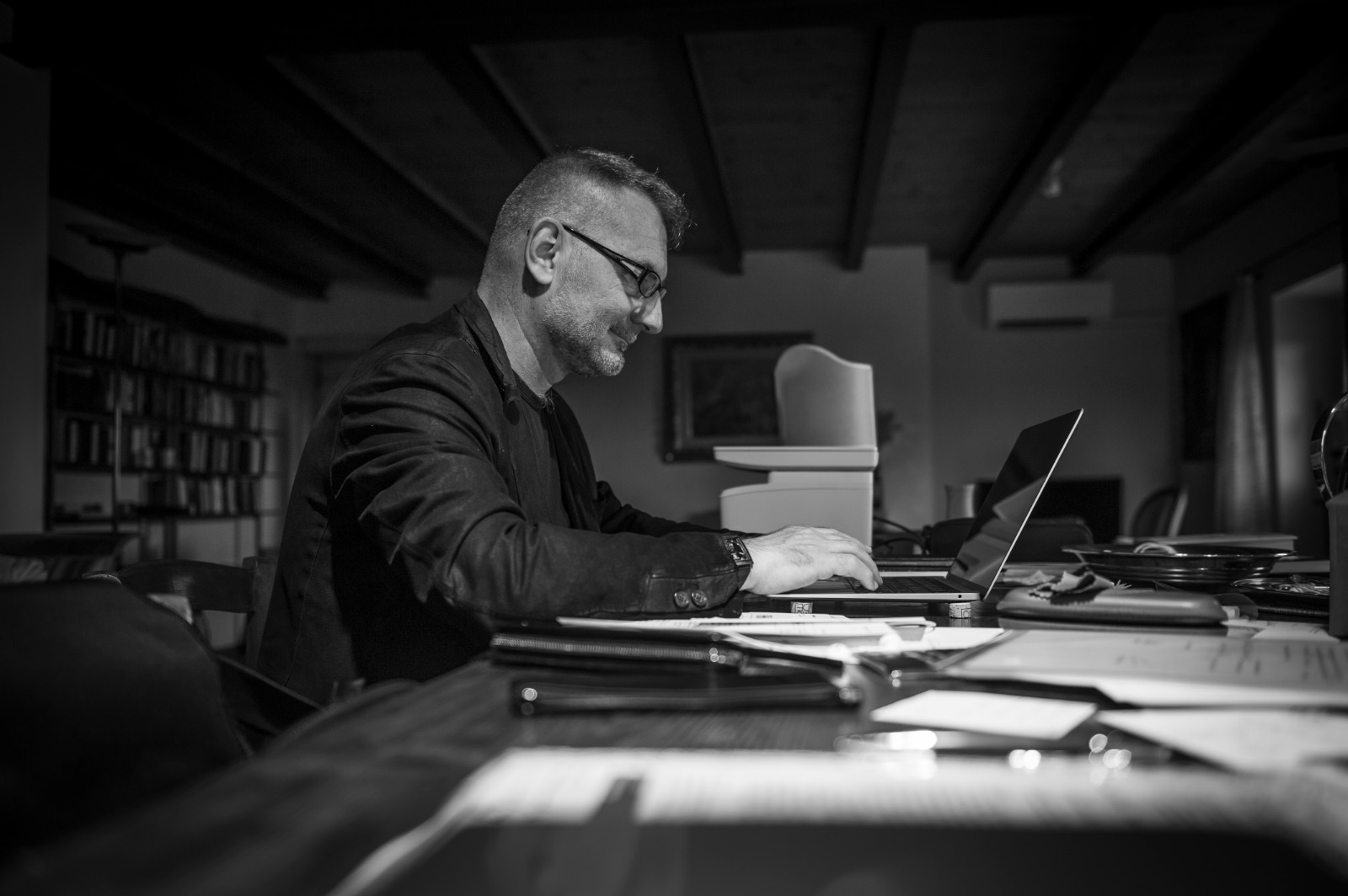 Marco Asquini working at his desk